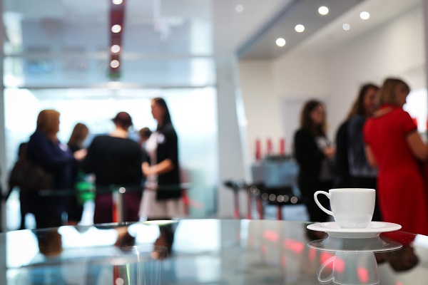 The EIPM Club: people discussing during a coffee break